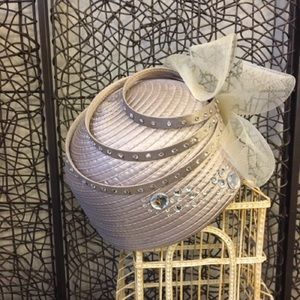 Taupe cloche hat with jeweled accents and bow